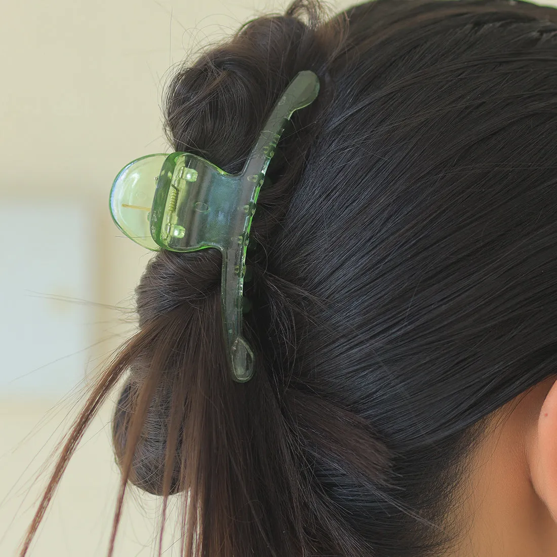 Chic Set Of Three Hair Clutches In Transparent, Tan, Green, And Grey Shades.