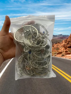 Large Lot of Damaged Charm Bangles